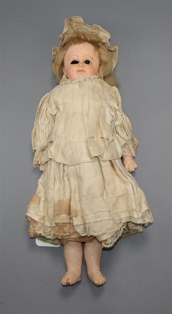 A bisque head doll